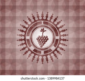 bunch of grapes icon inside red seamless emblem or badge with abstract geometric pattern background.