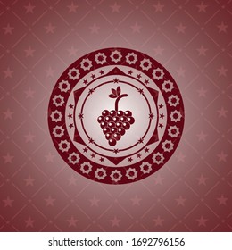 manojo de uvas icono dentro del emblema rojo. 