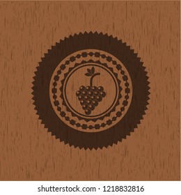 bunch of grapes icon inside retro style wooden emblem