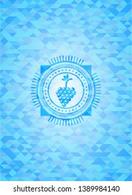 bunch of grapes icon inside sky blue emblem with mosaic background
