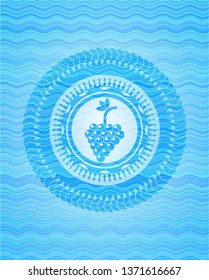 bunch of grapes icon inside water representation badge background.