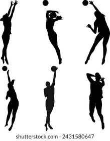 A Bunch of people playing beach volleyball silhouette