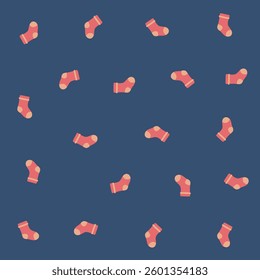 a bunch of socks that are on a blue surface