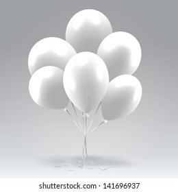 Bunch of white glossy inflatable balloons over light background