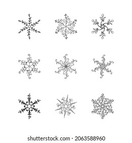Paket von Weihnachtsschneeflocken mit kalligrafischen Vektorgrafiken. Handgezeichnete Set-Ikone im trendigen, flachen Stil einzeln auf weißem Hintergrund. Weihnachtsschnee Wintergrafik.