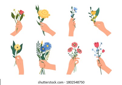 Bundle of hands holding bouquets of wildflowers. Floral set. Stylish decorative design. Blooming flowers. Romantic present for a loved one. All objects are isolated and grouped. Vector Illustration