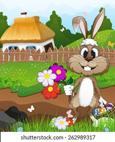 Bunny with a basket of Easter eggs and flowers in a meadow near the farmhouse with a thatched roof. Easter landscape