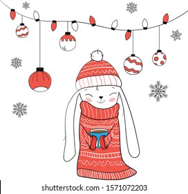 bunny in a christmas sweater with cocoa