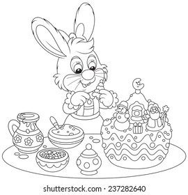 Bunny decorating a Christmas cake