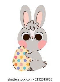 bunny with easter egg over white