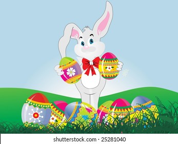 bunny with egg on the ground