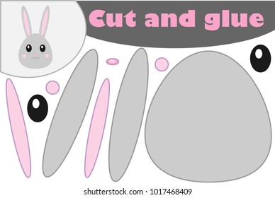 Bunny head, easter education paper game for the development of preschool children, use scissors and glue to create the applique, cut parts of the image and glue on the paper, vector illustration
