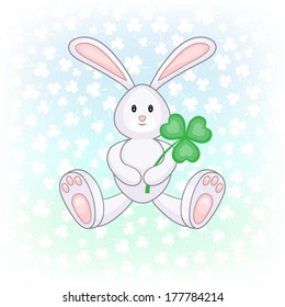 Bunny holding clover leaf