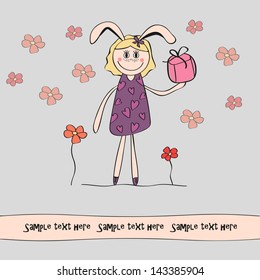 Bunny holding a gift for a holiday