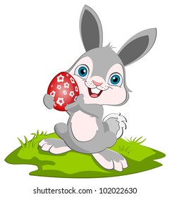 A bunny holding an red easter egg and smiling, cartoon character.