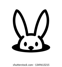 Bunny in hole. Easter rabbit icon isolated on white 