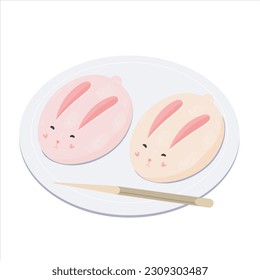 Bunny Mochi Mooncakes on plate with chopstick.