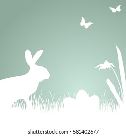 bunny silhouette with blue colored background for Easter time