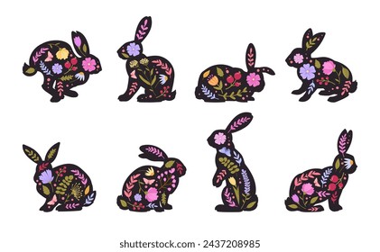 Bunny silhouettes. Easter flowers decorated rabbits, eared Easter hares flat vector illustration set. Spring holiday rabbits silhouettes