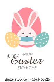 Bunny wearing a face mask against covid-19. Easter greeting card. Coronovirus alert for Easter 2020.