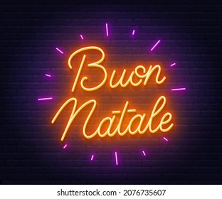 Buon Natale neon text. Greeting card on brick wall background.