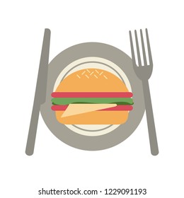 Burger on dish with cutlery