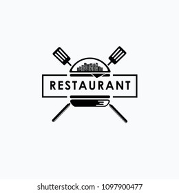 the burger restaurant logos using burger and spatula with the city inside concept