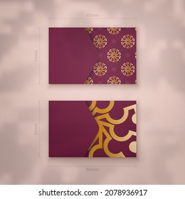 Burgundy abstract gold pattern business card for your brand.