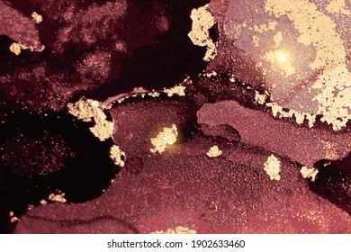 Burgundy and gold pattern with texture of geode and sparkles. Abstract vector background in alcohol ink technique. Modern paint with glitter. Template for banner, poster design. Fluid art painting