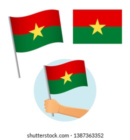 Burkina Faso flag in hand. Patriotic background. National flag of Burkina Faso vector illustration