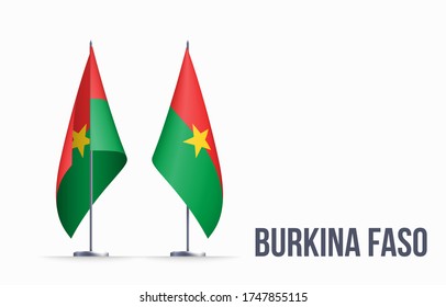 Burkina Faso flag state symbol isolated on background national banner. Greeting card National Independence Day of the Republic of Burkina Faso. Illustration banner with realistic state flag.