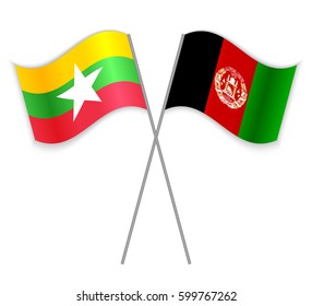Burmese and Afghan crossed flags. Myanmar combined with Afghanistan isolated on white. Language learning, international business or travel concept.