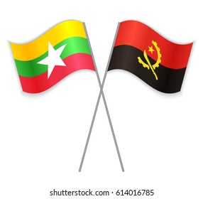 Burmese and Angolan crossed flags. Burma combined with Angola isolated on white. Language learning, international business or travel concept.