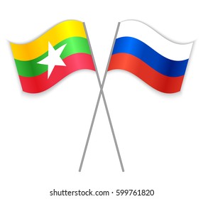 Burmese and Russian crossed flags. Myanmar combined with Russia isolated on white. Language learning, international business or travel concept.