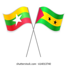 Burmese and Sao Tomean crossed flags. Burma combined with Sao Tome and Principe isolated on white. Language learning, international business or travel concept.