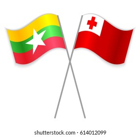Burmese and Tongan crossed flags. Burma combined with Tonga isolated on white. Language learning, international business or travel concept.