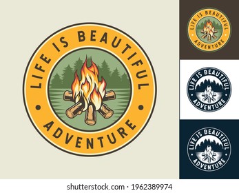 Burning campfire emblem with flame for camping design or t-shirt print. Colored set