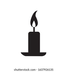 burning candle in candle in candlestick icon