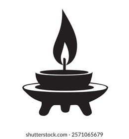 burning candle or diya black silhouette in a pot