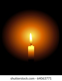 Burning candle on a black background