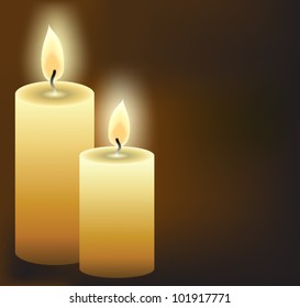 burning candles on dark background