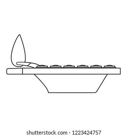 burning diya on white background