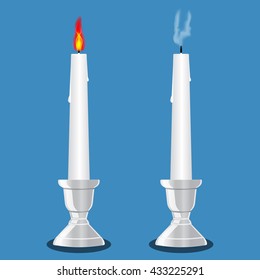 Burning and extinct candle in a candlestick