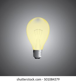 Burning light bulb on grey background