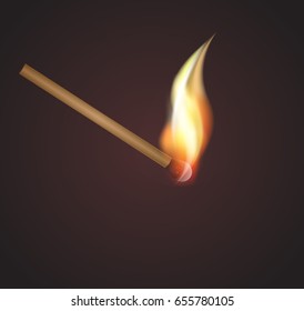 burning match on dark background