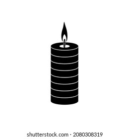 A burning paraffin candle of rectangular shape with rings on a white background. Vector image.