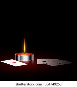 burning small candle and cards