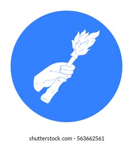 Burning torch in the hand icon in black style isolated on white background. Stone age symbol stock vector illustration.