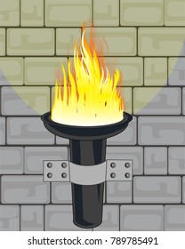 Burninging torchlight on wall of the building