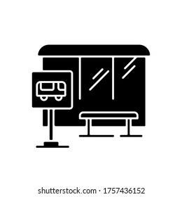 Bus stop black glyph icon. Wait for public transport. Urban commuter transit. City infrastructure. Road sign near sidewalk. Silhouette symbol on white space. Vector isolated illustration